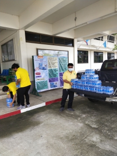 ไฟล์แนบ ร่วมสนับสนุนน้ำดื่มตราสัญลักษณ์ให้กับที่่ว่าการอำเภอพนมทวน