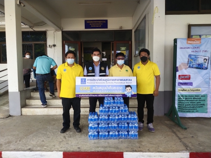 ไฟล์แนบ ร่วมสนับสนุนน้ำดื่มตราสัญลักษณ์ให้กับที่่ว่าการอำเภอพนมทวน